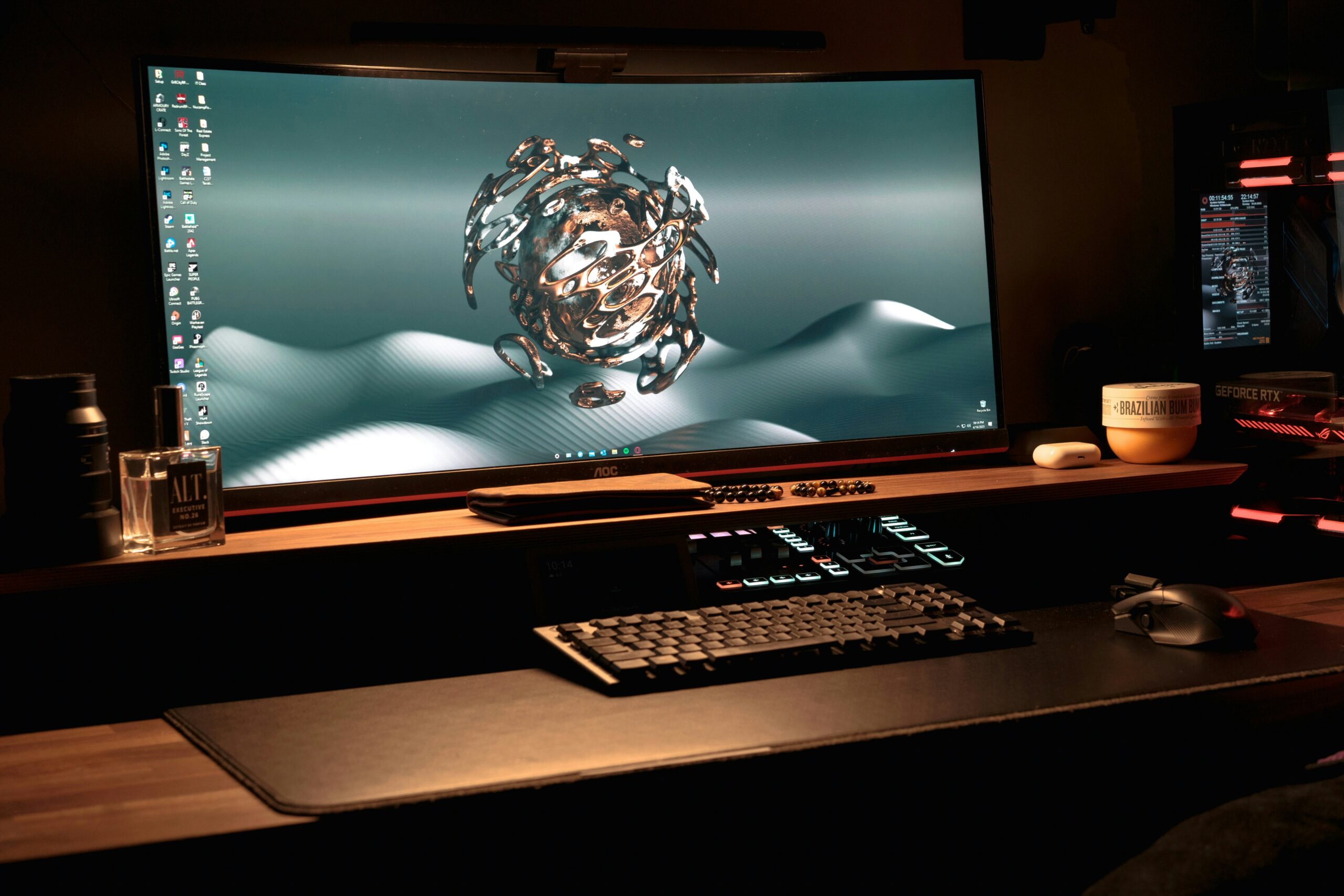 3D model wireframe on computer screen - a computer monitor sitting on top of a desk